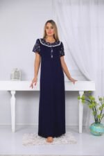 A long nightgown with a floral print on the chest with buttons